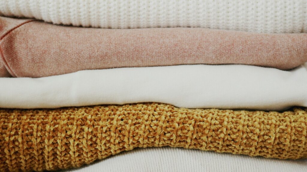 Why the Choice of Materials Matters: Impact on Durability, Cost, and Sustainability Clothing made from different materials, displayed together.